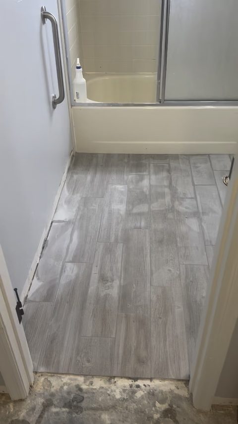 Completed bathroom with new flooring