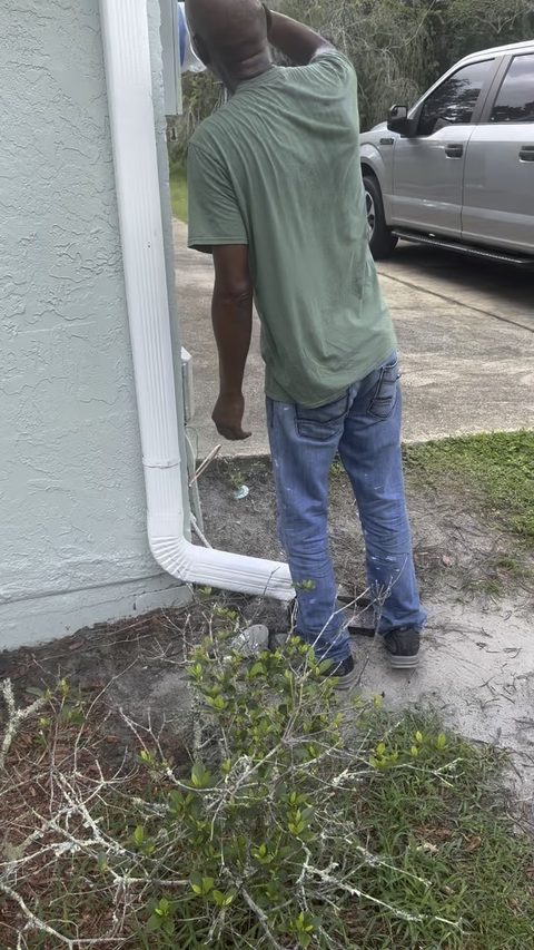 Checking the exterior of a Brevard home