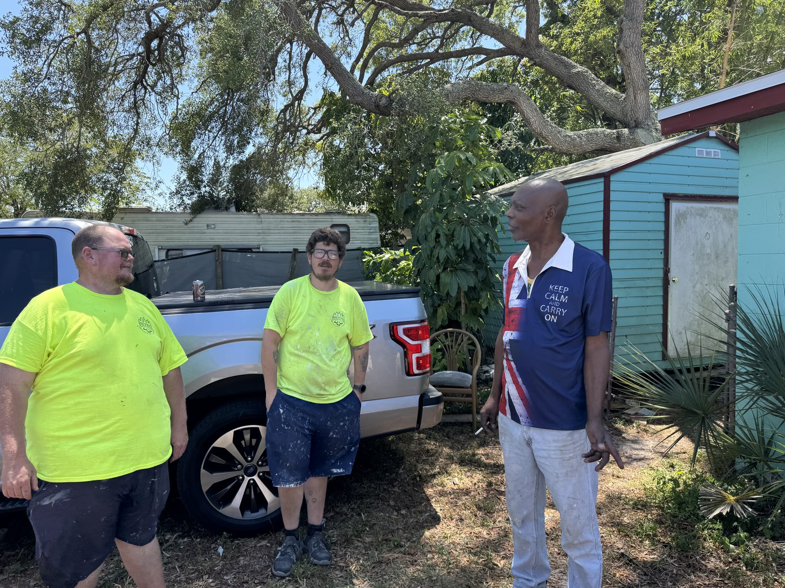 The crew outside a Brevard home