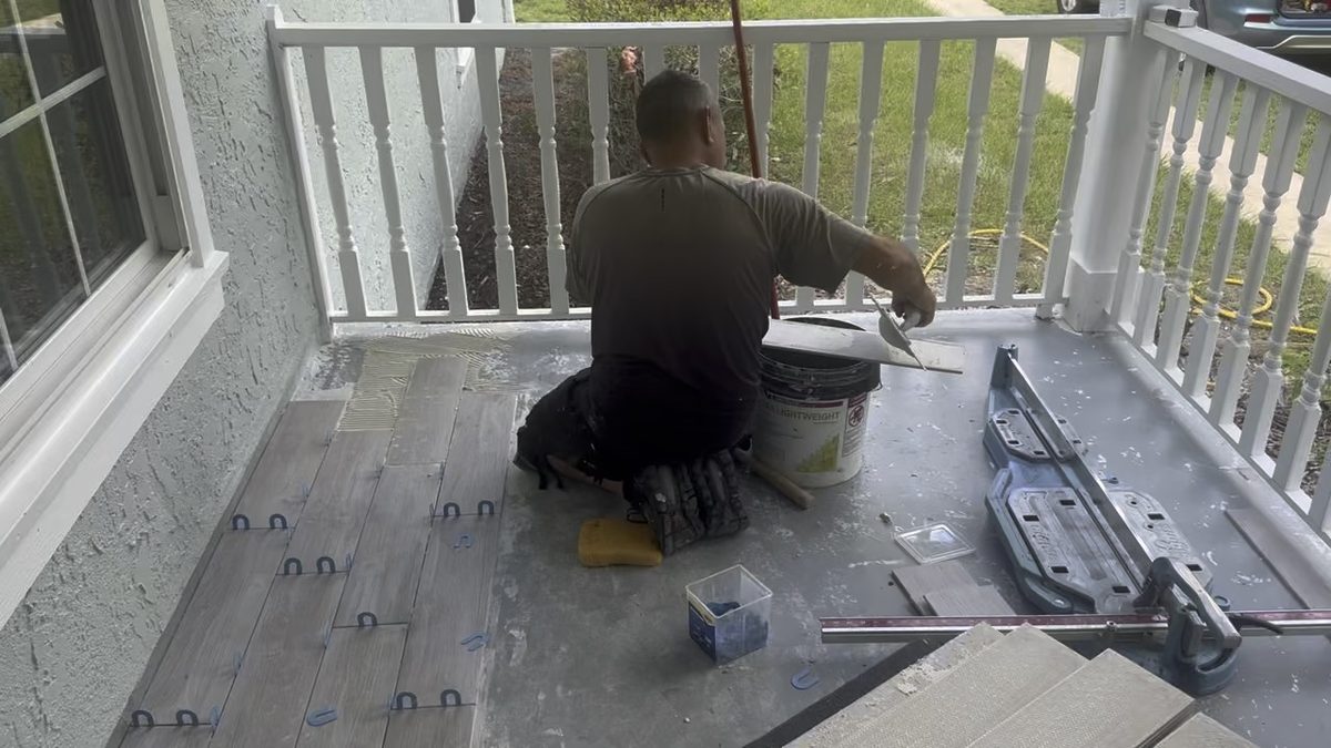 New flooring going down on a screened porch